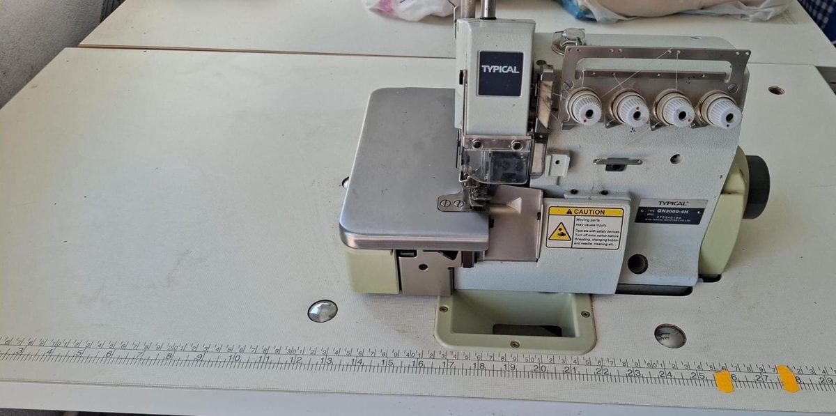 Masina cu transportul acului in material TYPICAL 1