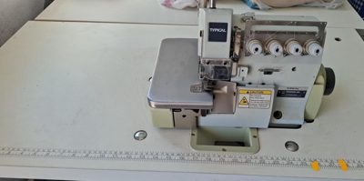 Masina cu transportul acului in material TYPICAL