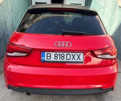 Autoturism marca Audi model A1 culoare Rosu