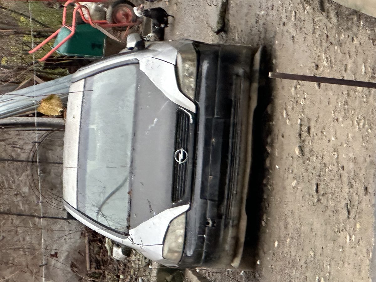 Autoturism marca Opel, model Astra, culoare gri 1