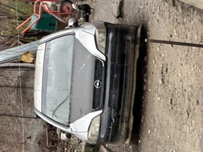 Autoturism marca Opel, model Astra, culoare gri